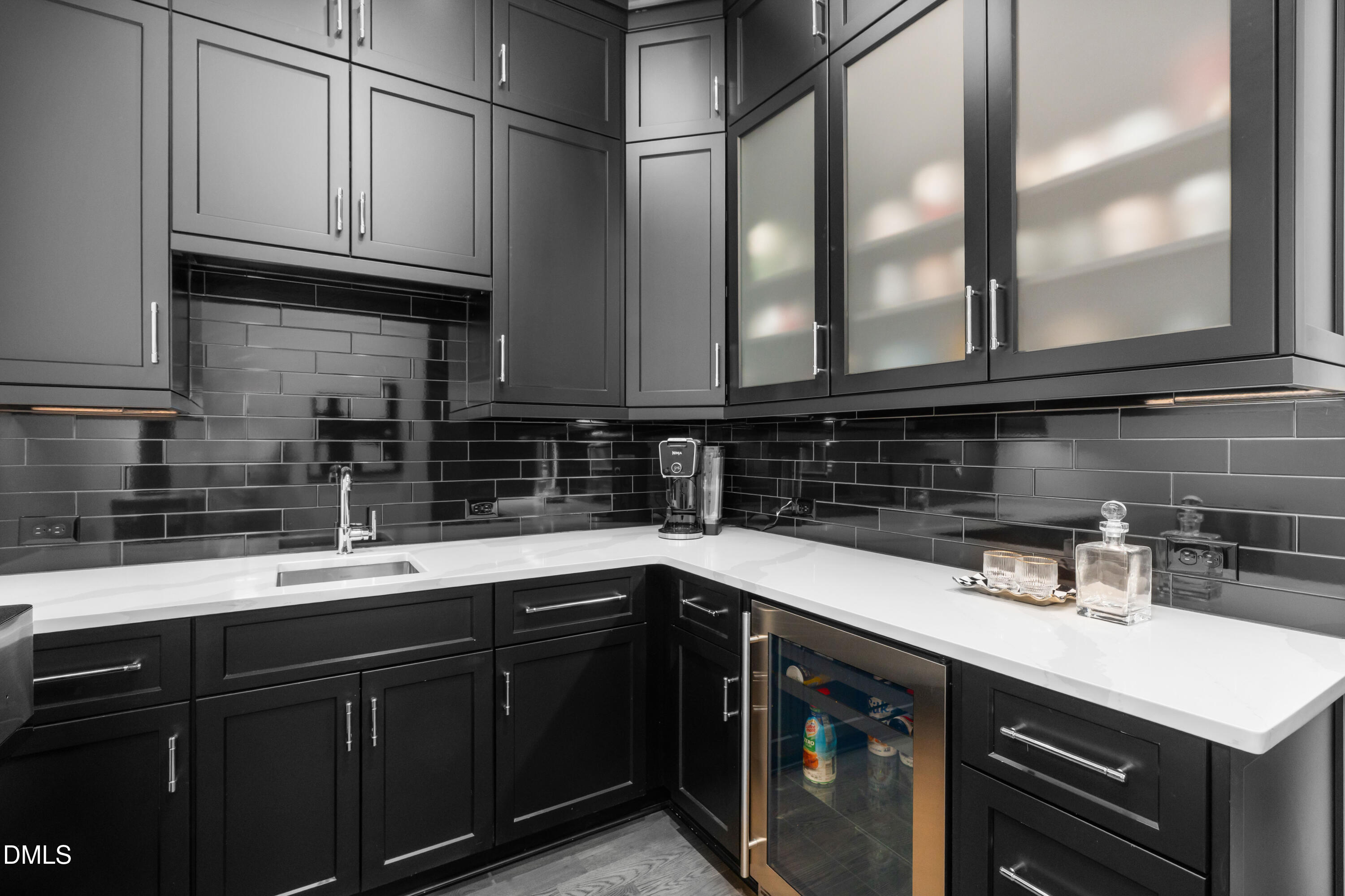 6508 Century Oak Court Raleigh, NC 27613 - Photo 24 of 91 a kitchen with stainless steel appliances granite countertop a sink and cabinets