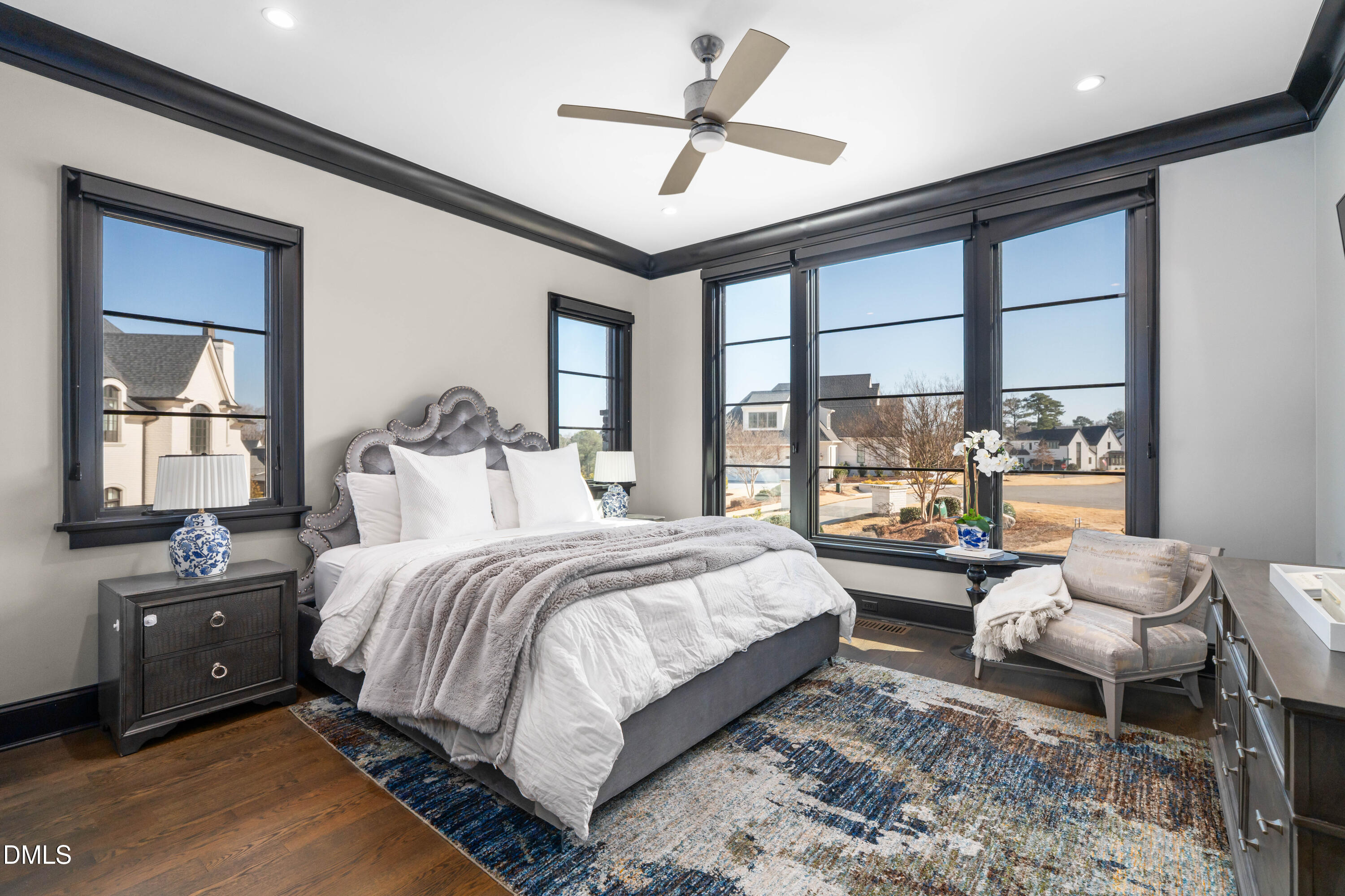 6508 Century Oak Court Raleigh, NC 27613 - Photo 28 of 91 a bedroom with a bed and a large window