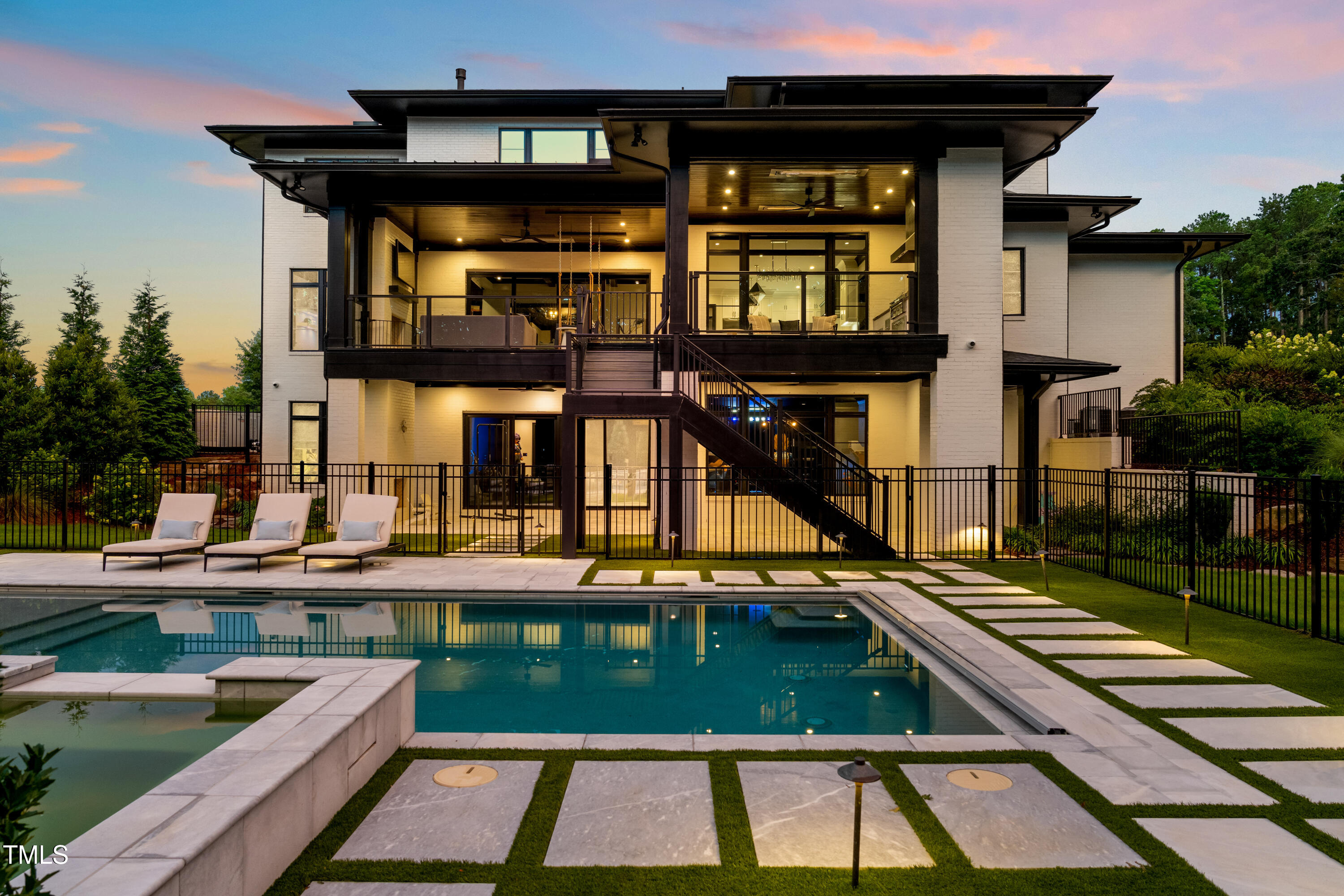 6508 Century Oak Court Raleigh, NC 27613 - Photo 3 of 91 a view of a patio with table and chairs with wooden floor and fence