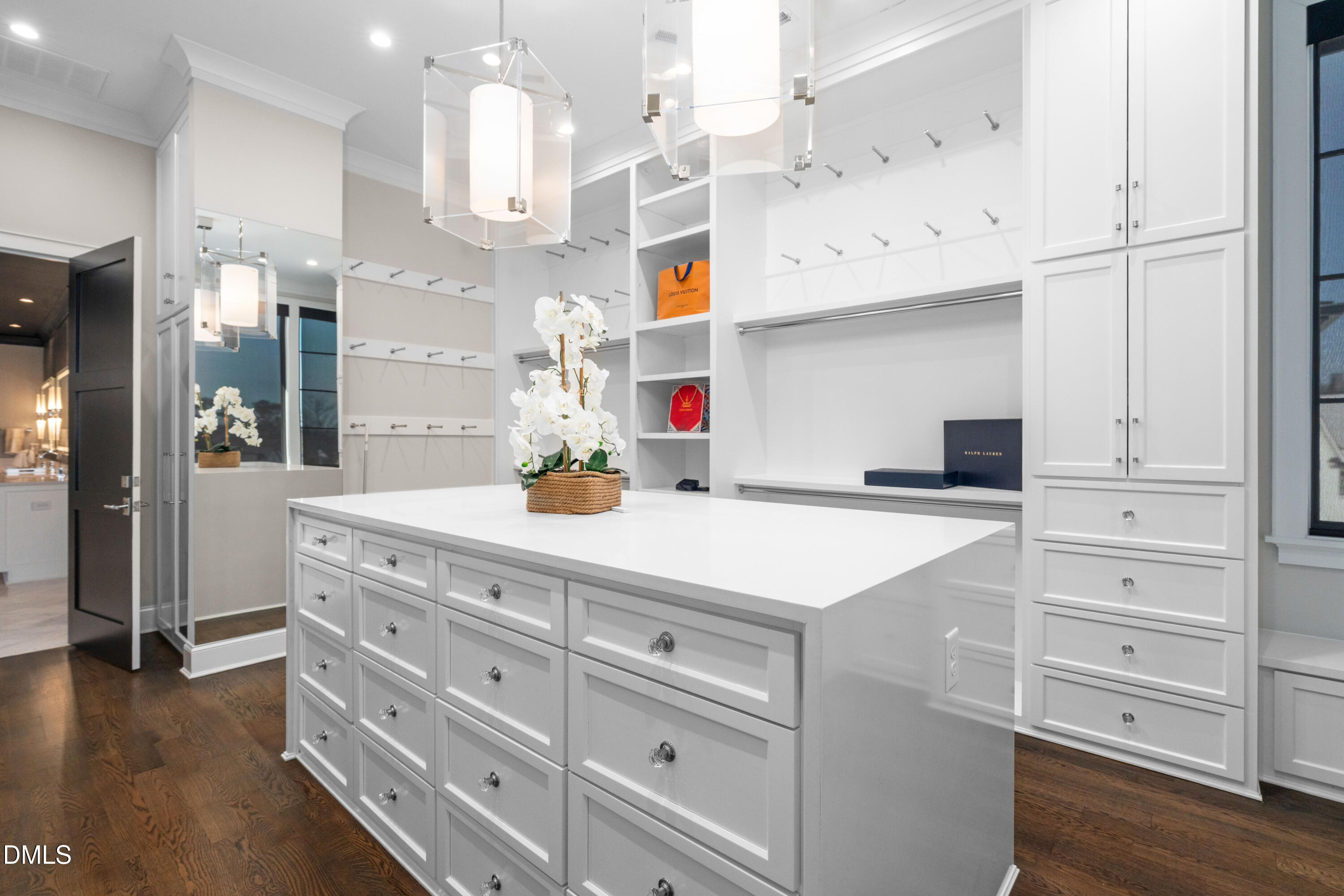 6508 Century Oak Court Raleigh, NC 27613 - Photo 44 of 91 a kitchen with cabinets appliances and a wooden floor