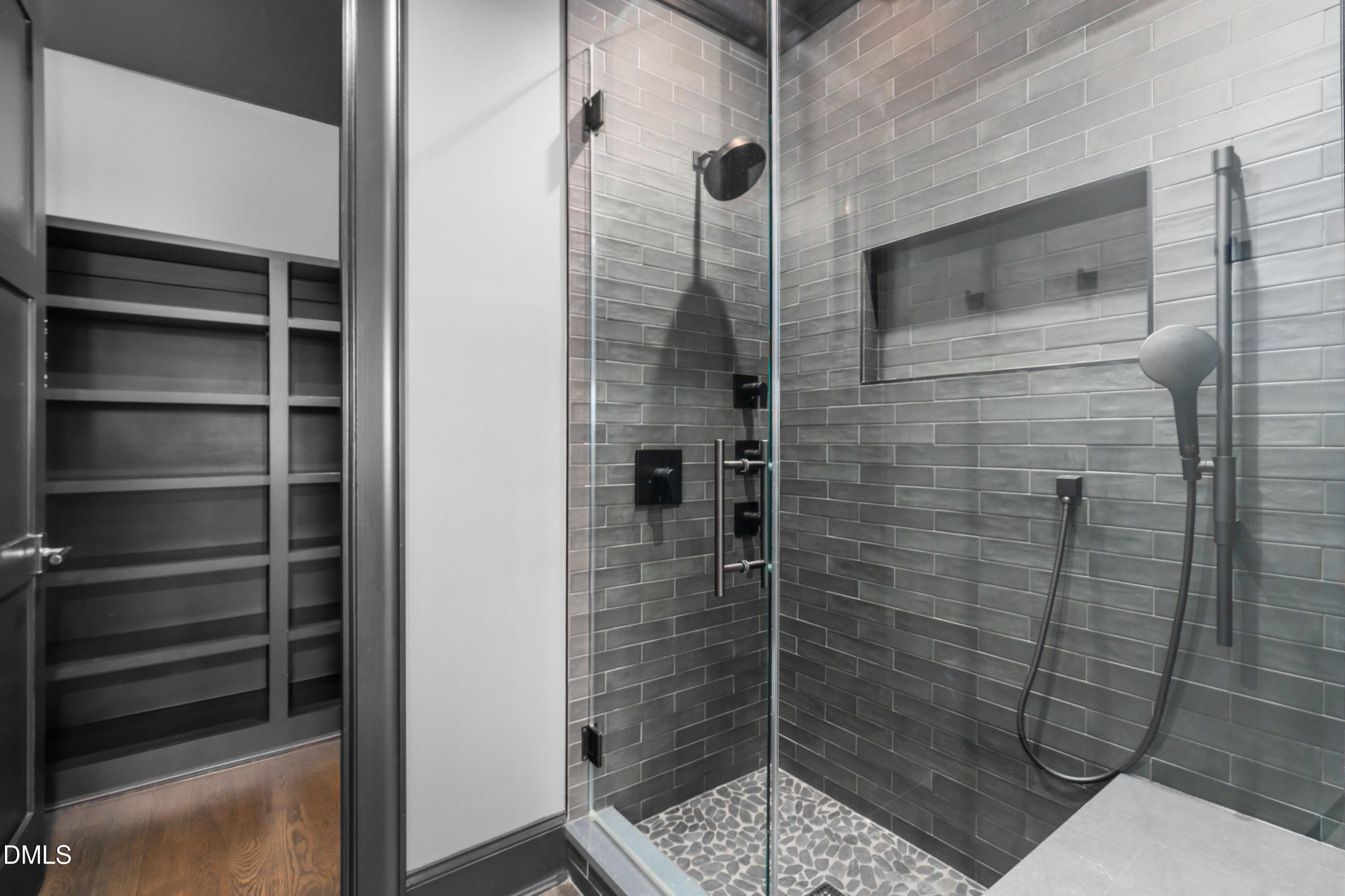 6508 Century Oak Court Raleigh, NC 27613 - Photo 56 of 91 a bathroom with a shower and a sink