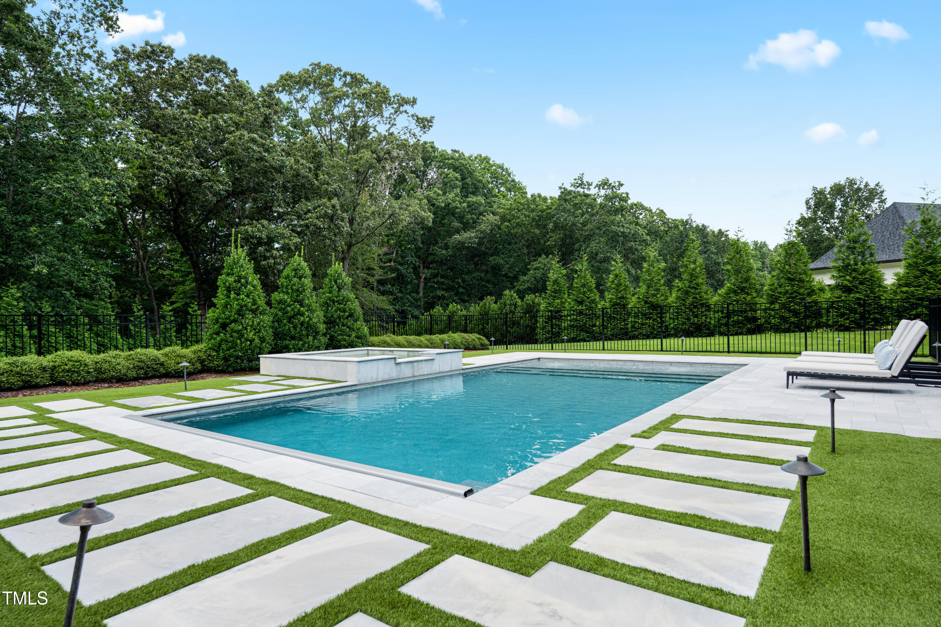6508 Century Oak Court Raleigh, NC 27613 - Photo 70 of 91 a view of a swimming pool with a yard