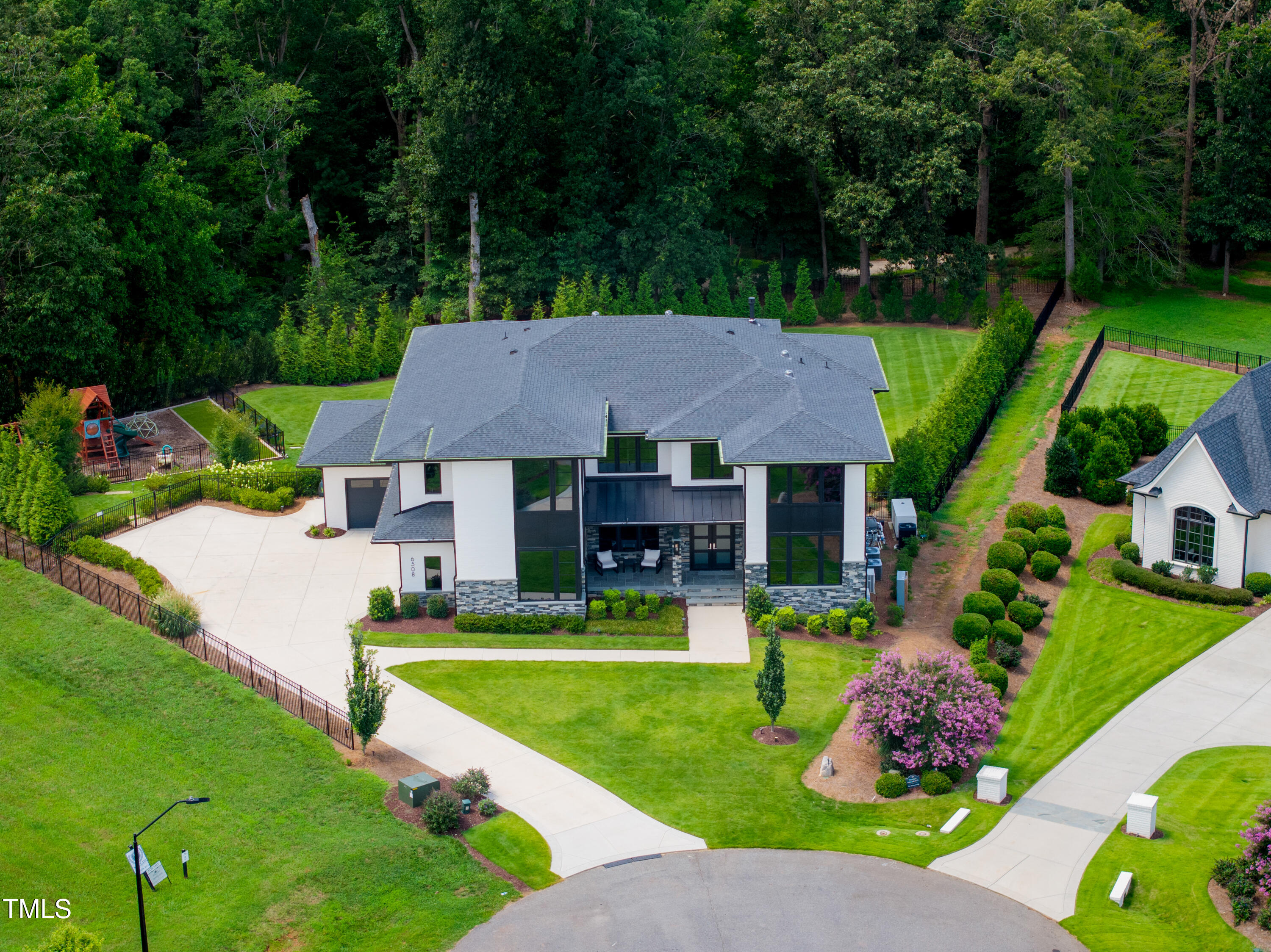 6508 Century Oak Court Raleigh, NC 27613 - Photo 87 of 91 a aerial view of a house with swimming pool garden and patio