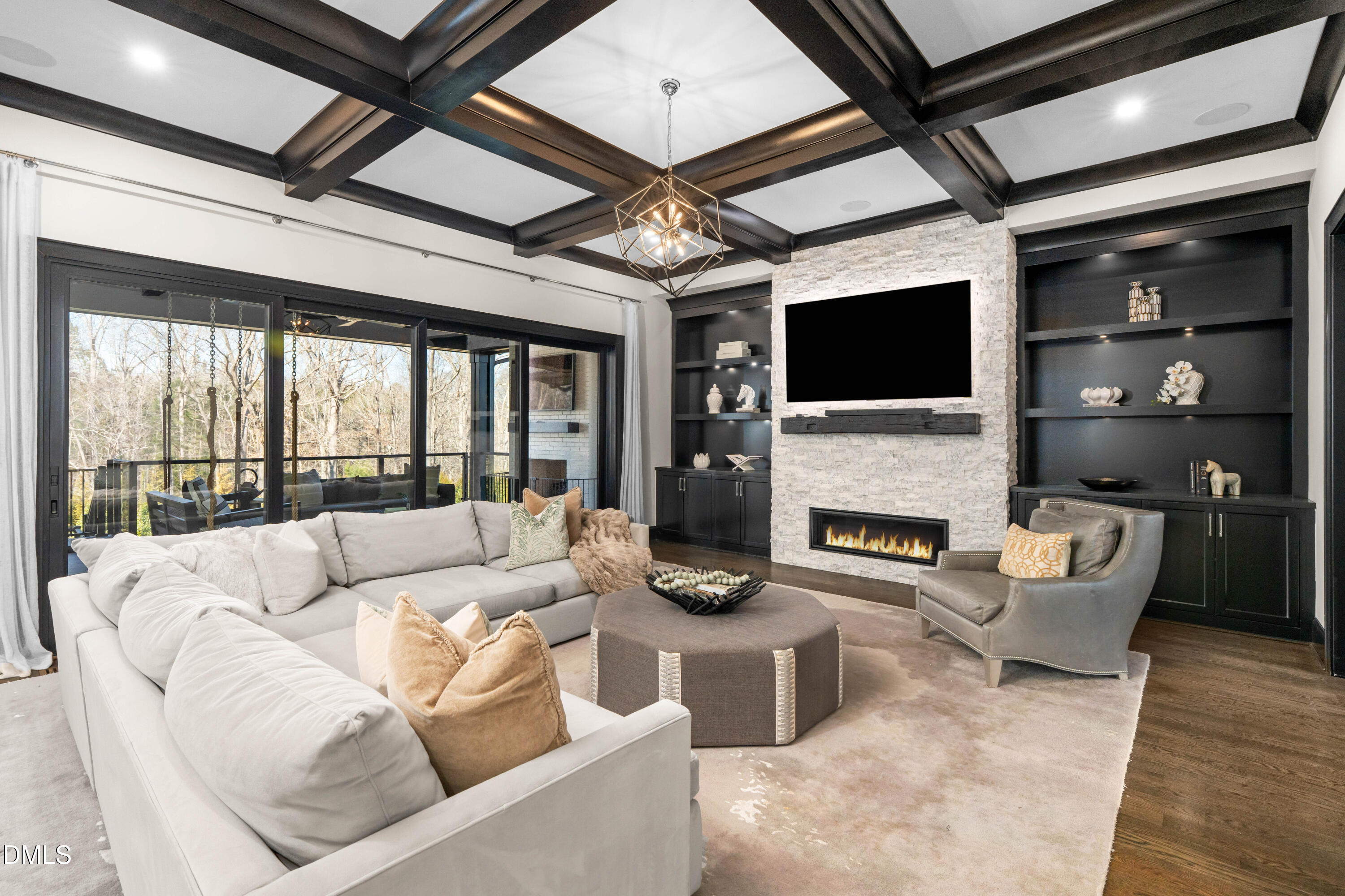 6508 Century Oak Court Raleigh, NC 27613 - Photo 9 of 91 a living room with furniture a fireplace and a flat screen tv