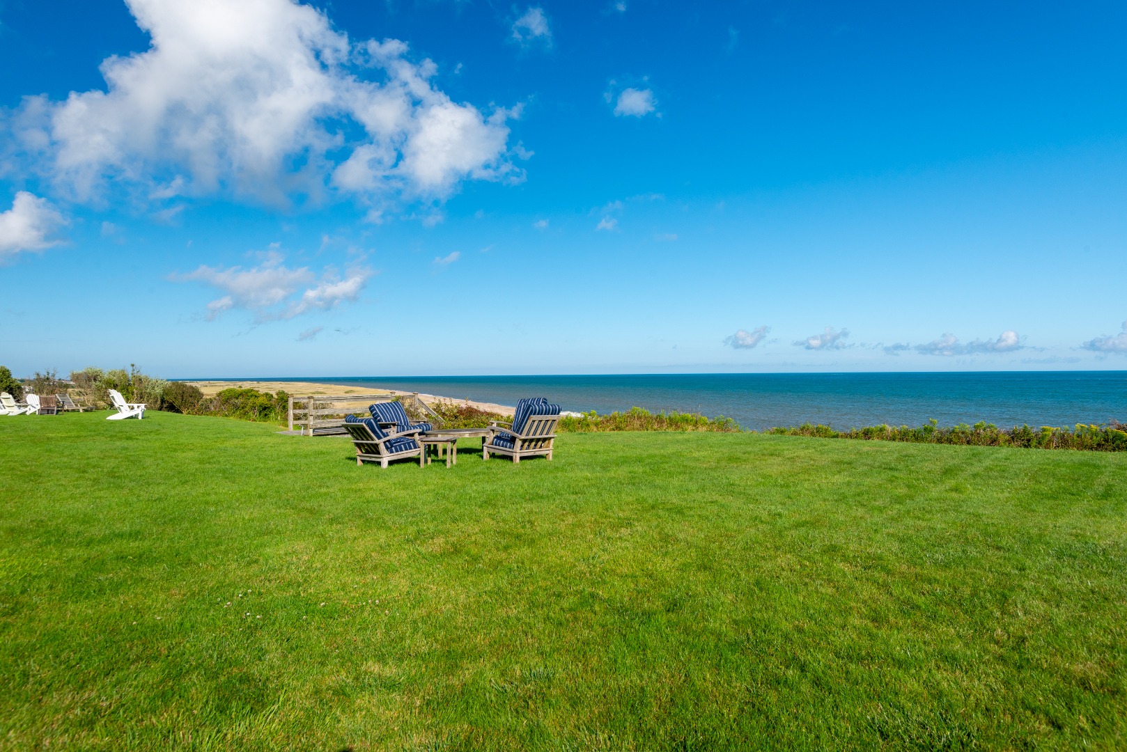 1 Reeds Way Nantucket, MA 02554 - Photo 10 of 51 a view of a golf course with chairs