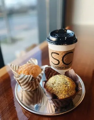 a kitchen with stainless steel appliances kitchen island granite countertop a lot of storage and utility