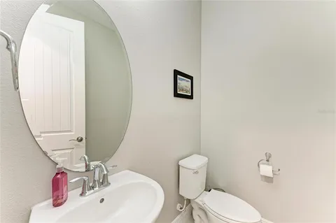 a bedroom with furniture and a baby crib