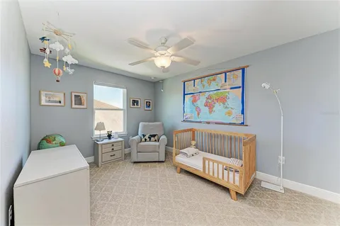 a view of a livingroom with furniture and closet