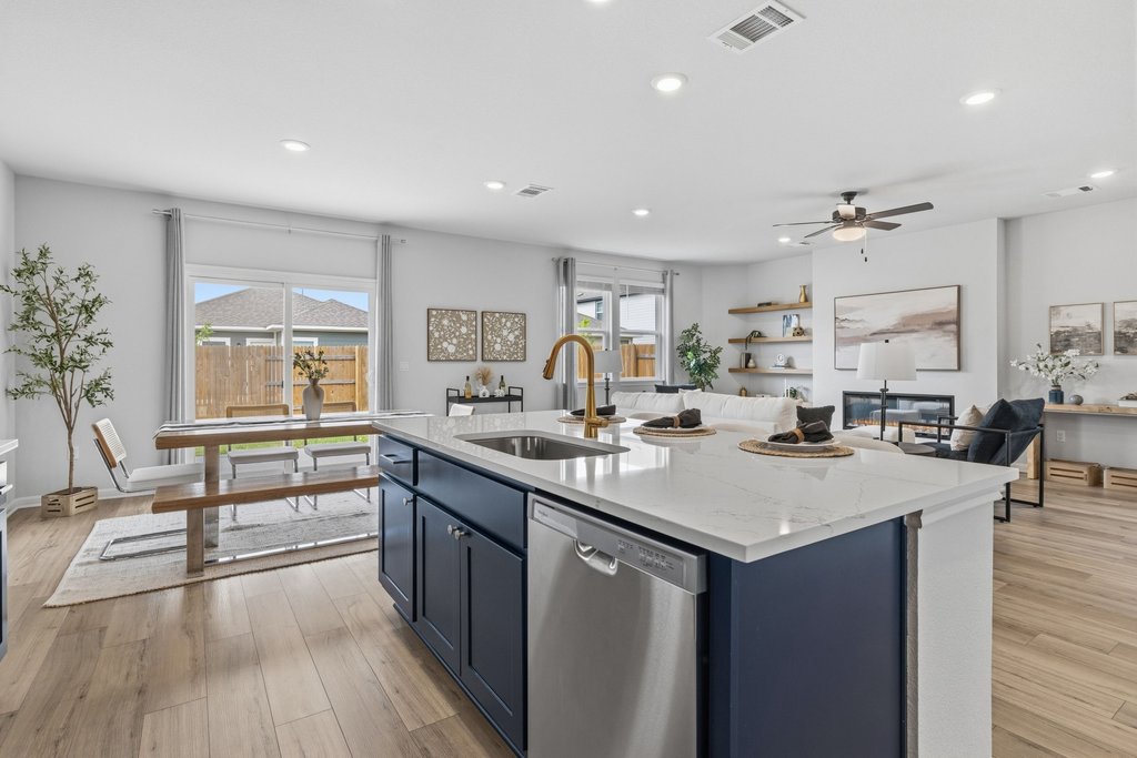 8001 Andravida Drive Austin, TX 78747 - Photo 12 of 35 Expansive kitchen island overlooking open living and dining
