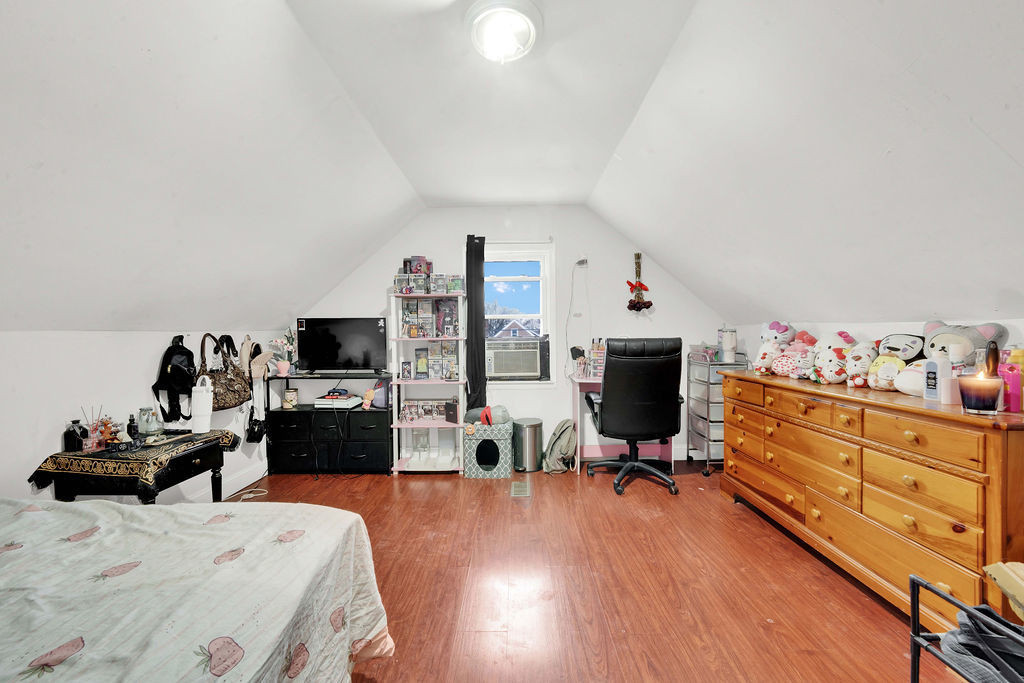 7234 South Ridgeway Avenue Chicago, IL 60629 - Photo 10 of 27 a bedroom with a bed and furniture
