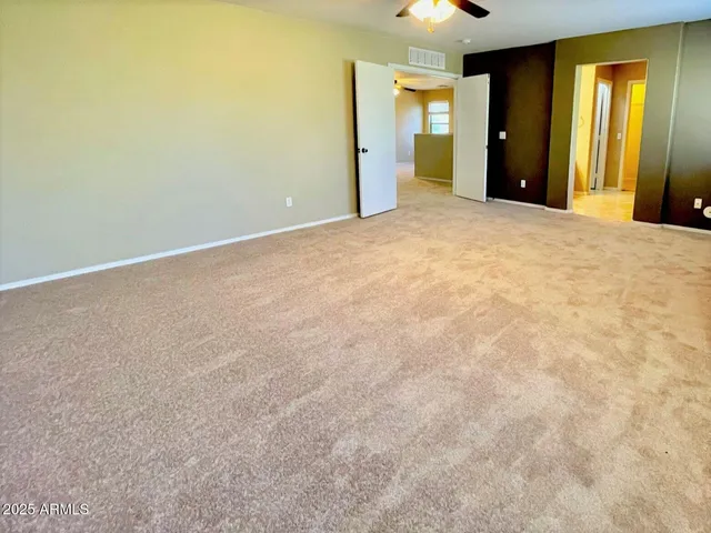 a view of an empty room with window