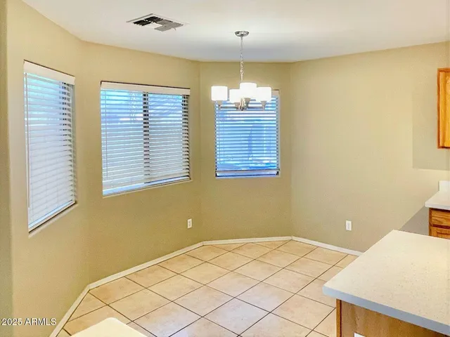 a view of a room with windows