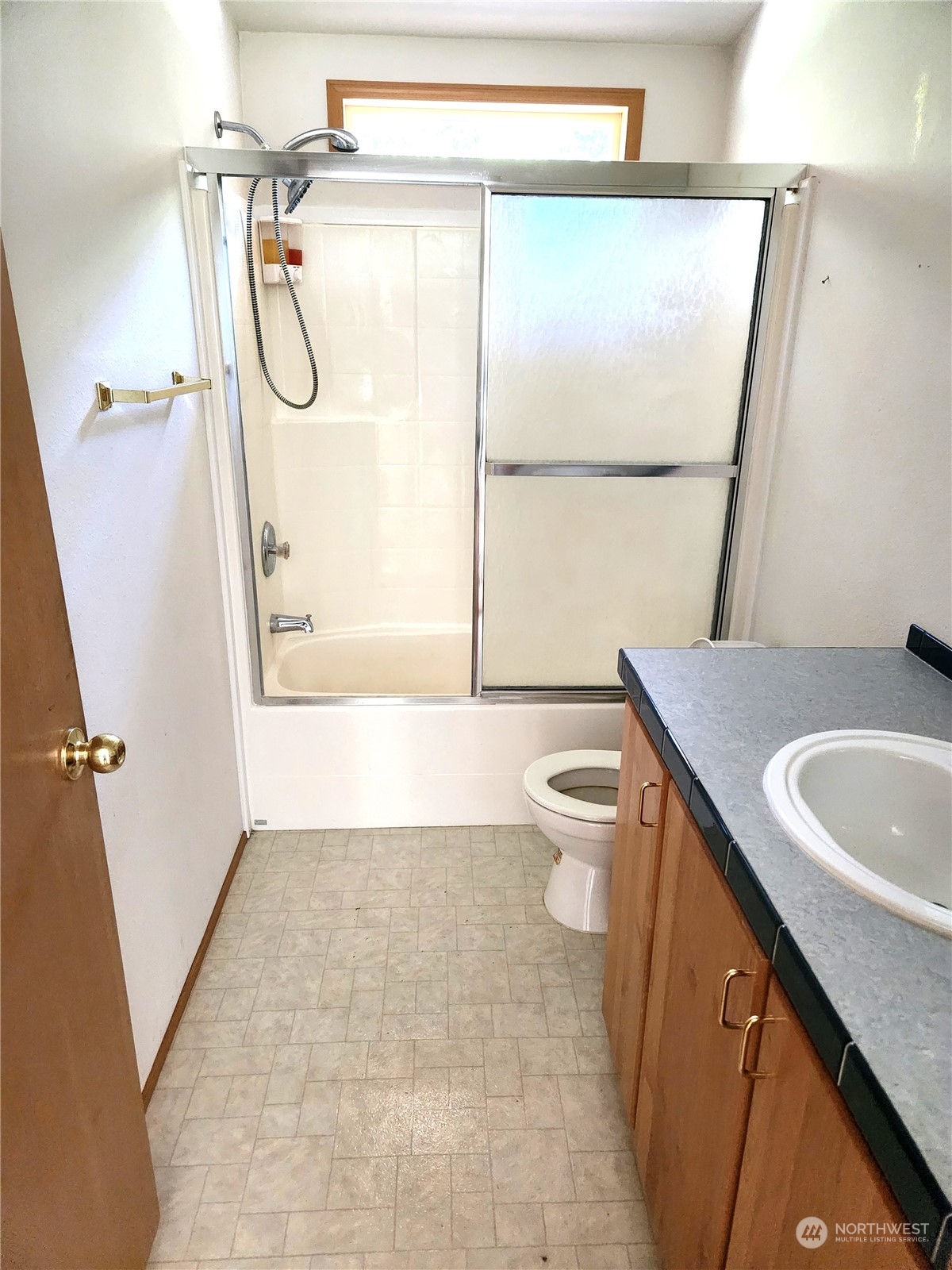 705 Eufaula Heights Road Longview, WA 98632 - Photo 13 of 17 a bathroom with a granite countertop sink toilet and shower