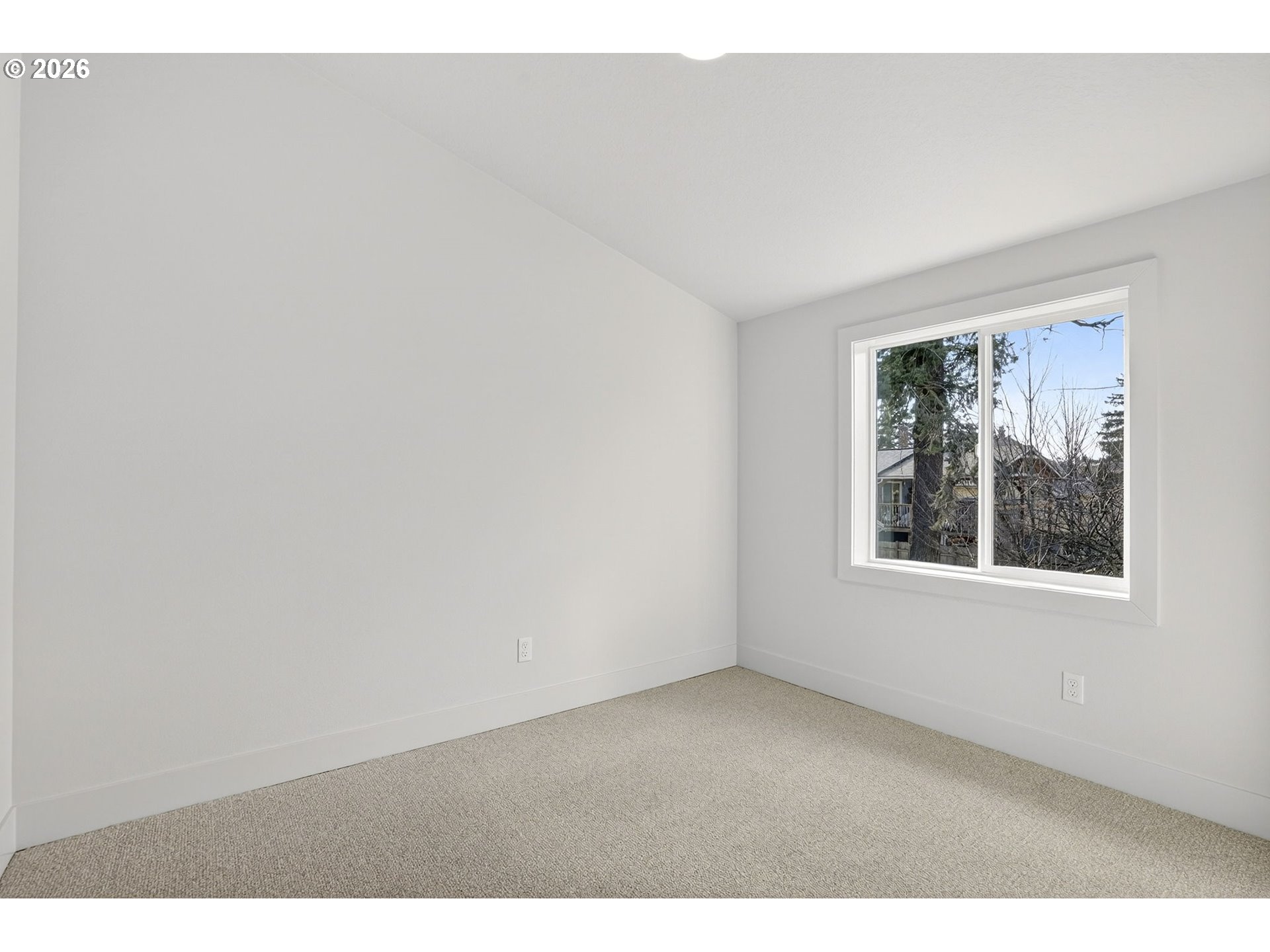 7602 Southeast Carlton Street, Unit B Portland, OR 97206 - Photo 29 of 34 a view of an empty room with a window