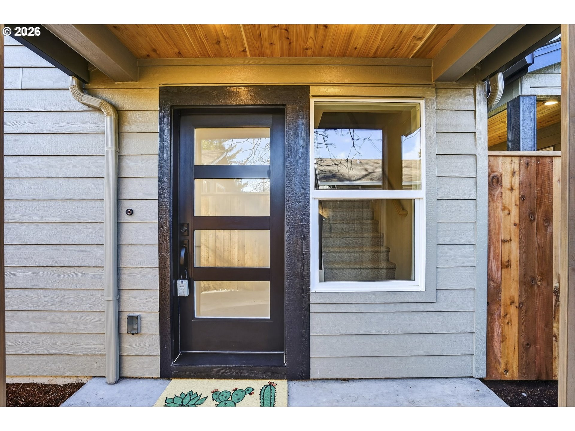 7602 Southeast Carlton Street, Unit B Portland, OR 97206 - Photo 5 of 34 a side view of a house with a window