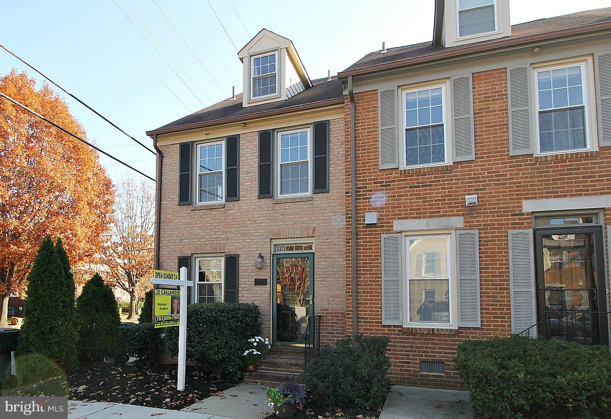 424 West Glebe Road Alexandria, VA 22305 - Photo 1 of 24 a front view of a house with garden