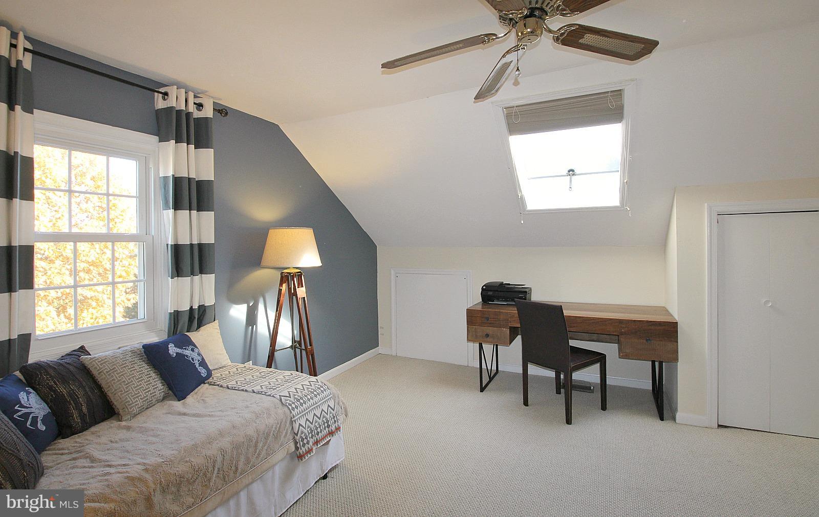 424 West Glebe Road Alexandria, VA 22305 - Photo 19 of 24 a bedroom with a bed and a chandelier