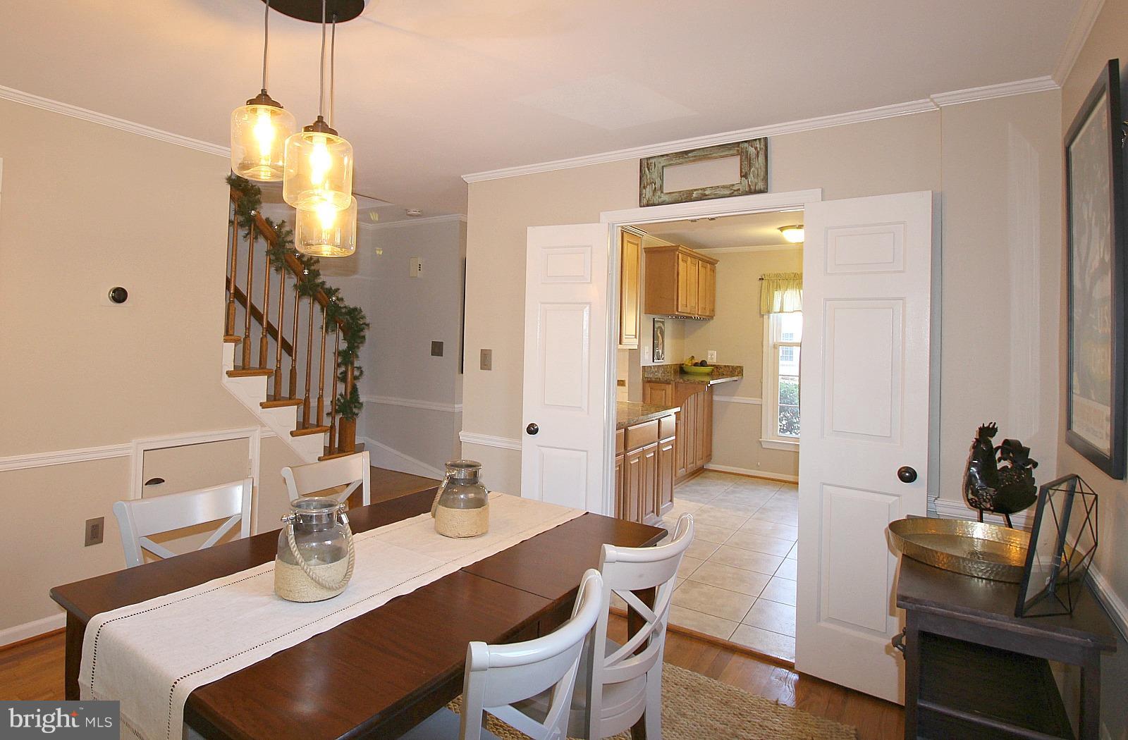 424 West Glebe Road Alexandria, VA 22305 - Photo 3 of 24 a dining room with furniture and wooden floor