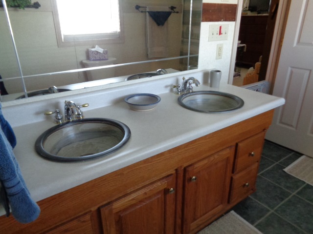 324 Craig Shop Road Mount Sidney, VA 24467 - Photo 14 of 28 a bathroom with a sink and a mirror