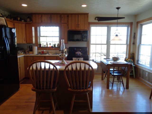 324 Craig Shop Road Mount Sidney, VA 24467 - Photo 7 of 28 a view of a dining room with furniture window and wooden floor