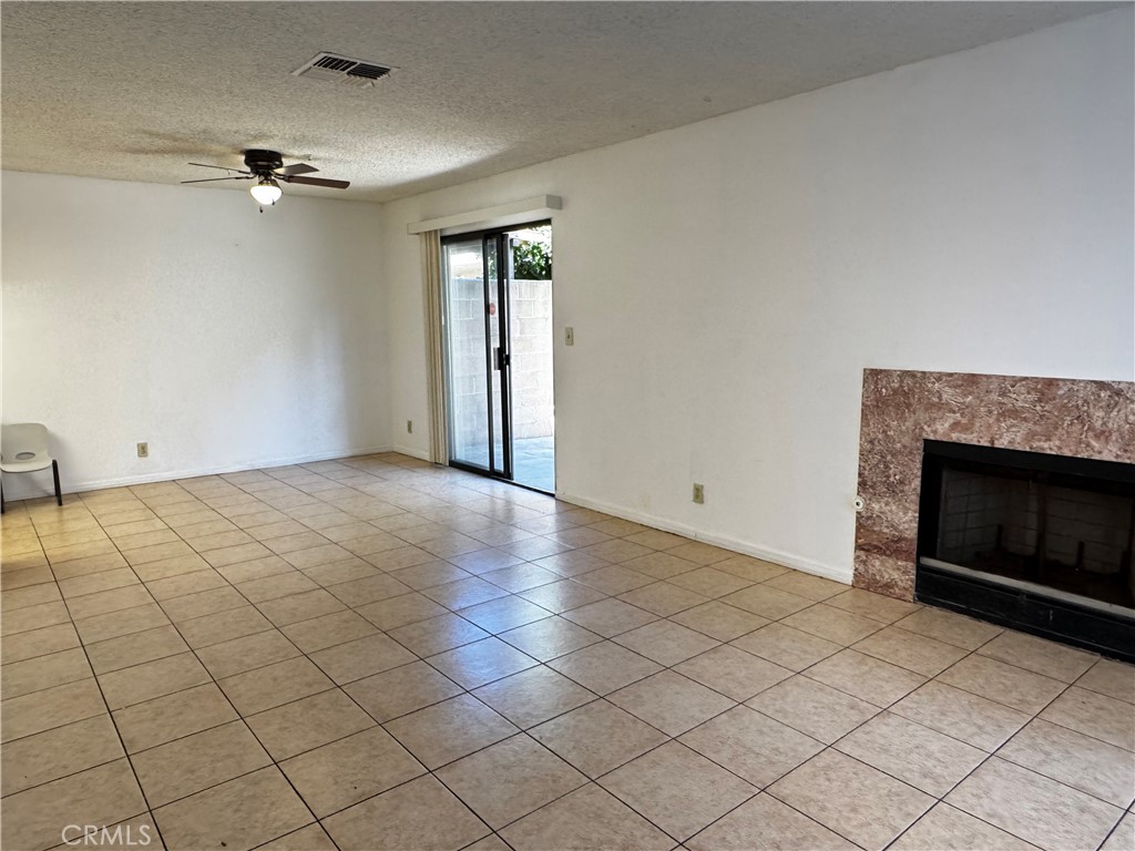 3930 Maxson, Unit F El Monte, CA 91732 - Photo 2 of 14 a view of an empty room with a fireplace