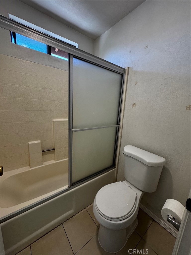 3930 Maxson, Unit F El Monte, CA 91732 - Photo 5 of 14 a white toilet sitting next to a shower
