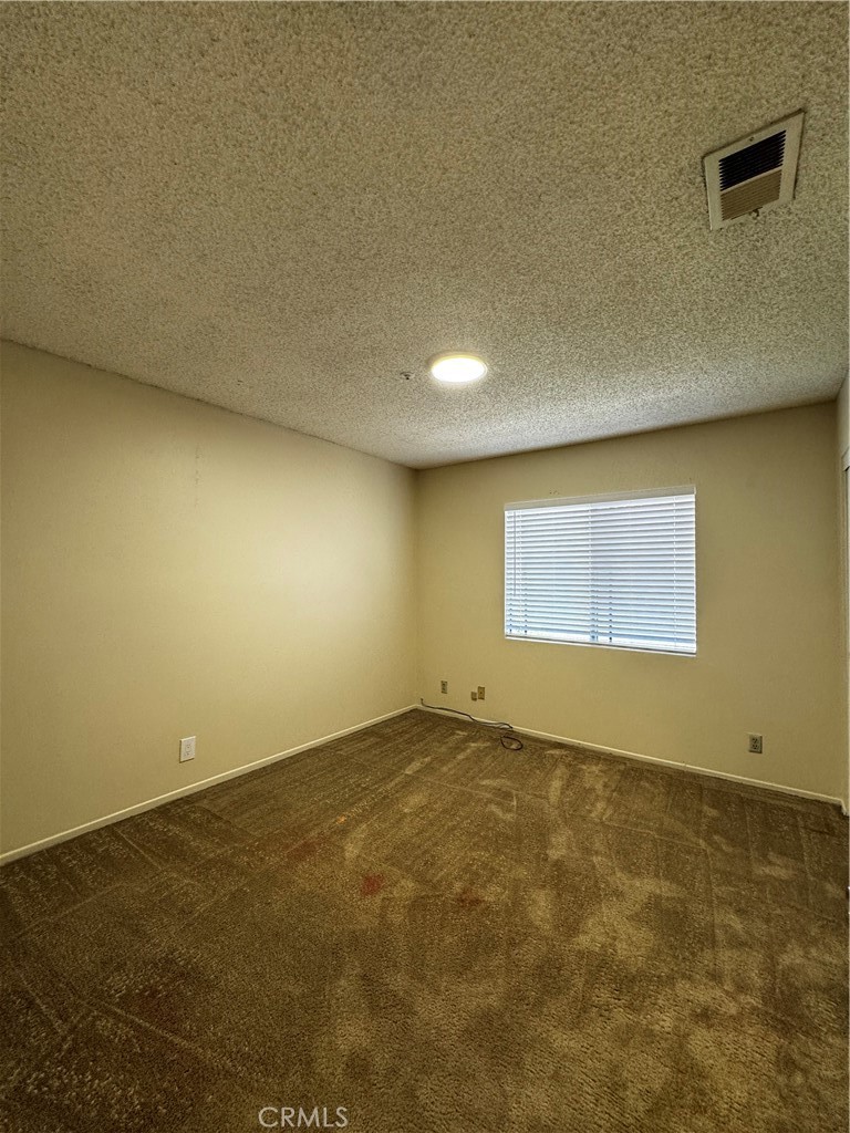 3930 Maxson, Unit F El Monte, CA 91732 - Photo 5 of 14 an empty room with a empty space and a window