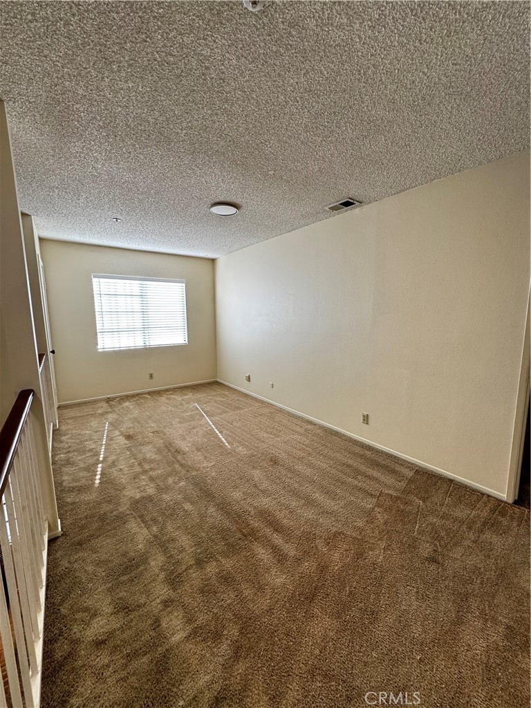 3930 Maxson, Unit F El Monte, CA 91732 - Photo 7 of 14 a view of an empty room and window