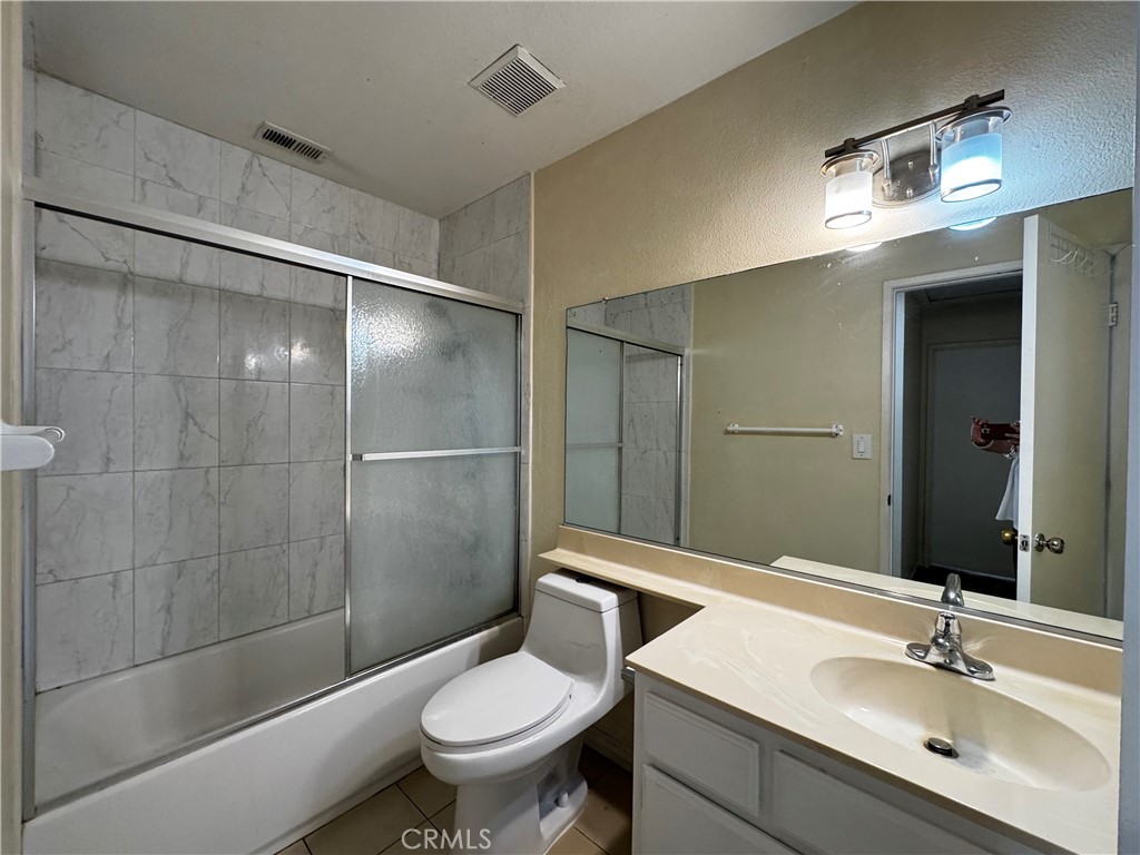 3930 Maxson, Unit F El Monte, CA 91732 - Photo 10 of 14 a bathroom with a sink toilet and shower