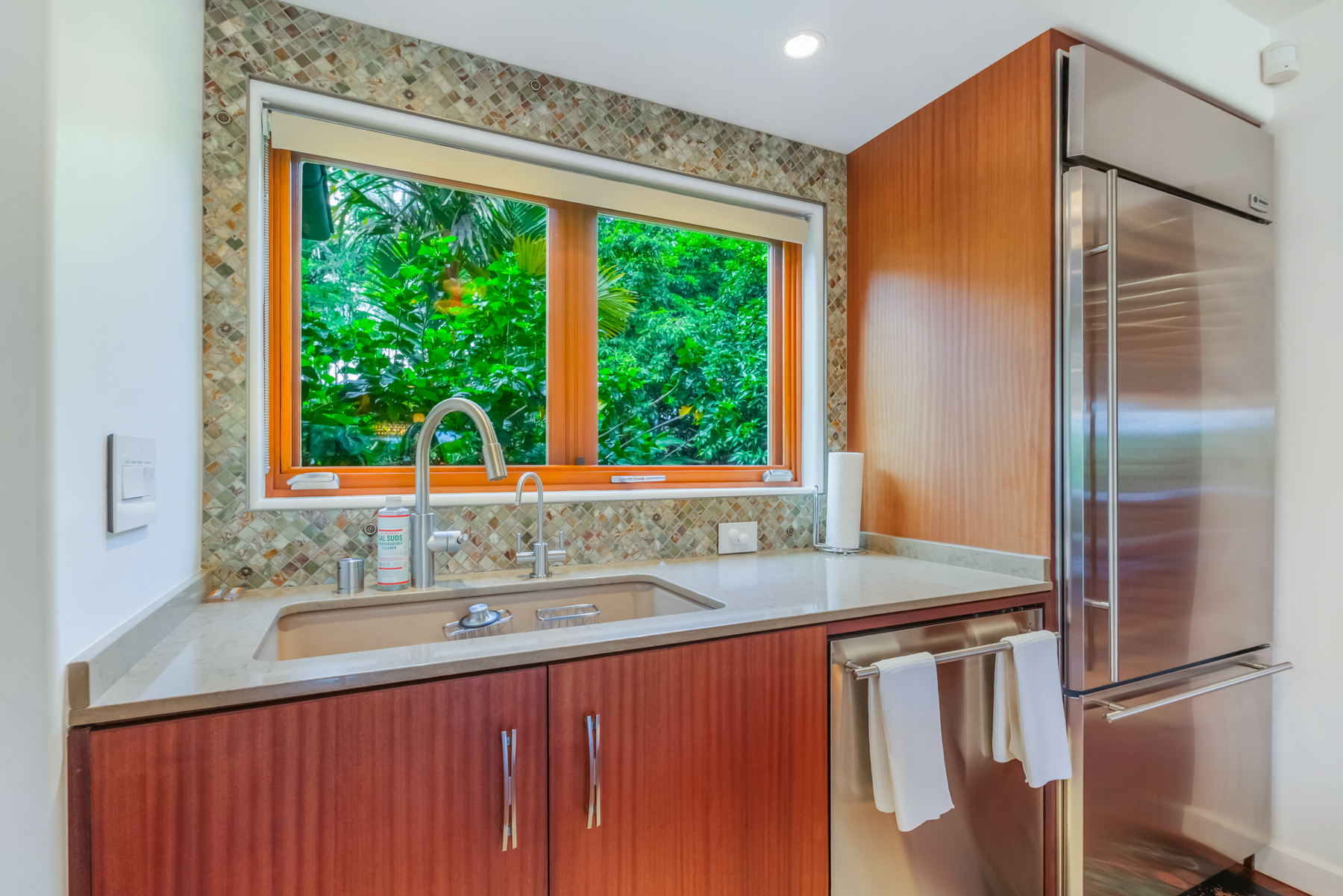 2874 A Kauapea Road Kilauea, HI 96754 - Photo 11 of 30 a bathroom with a sink and a large mirror