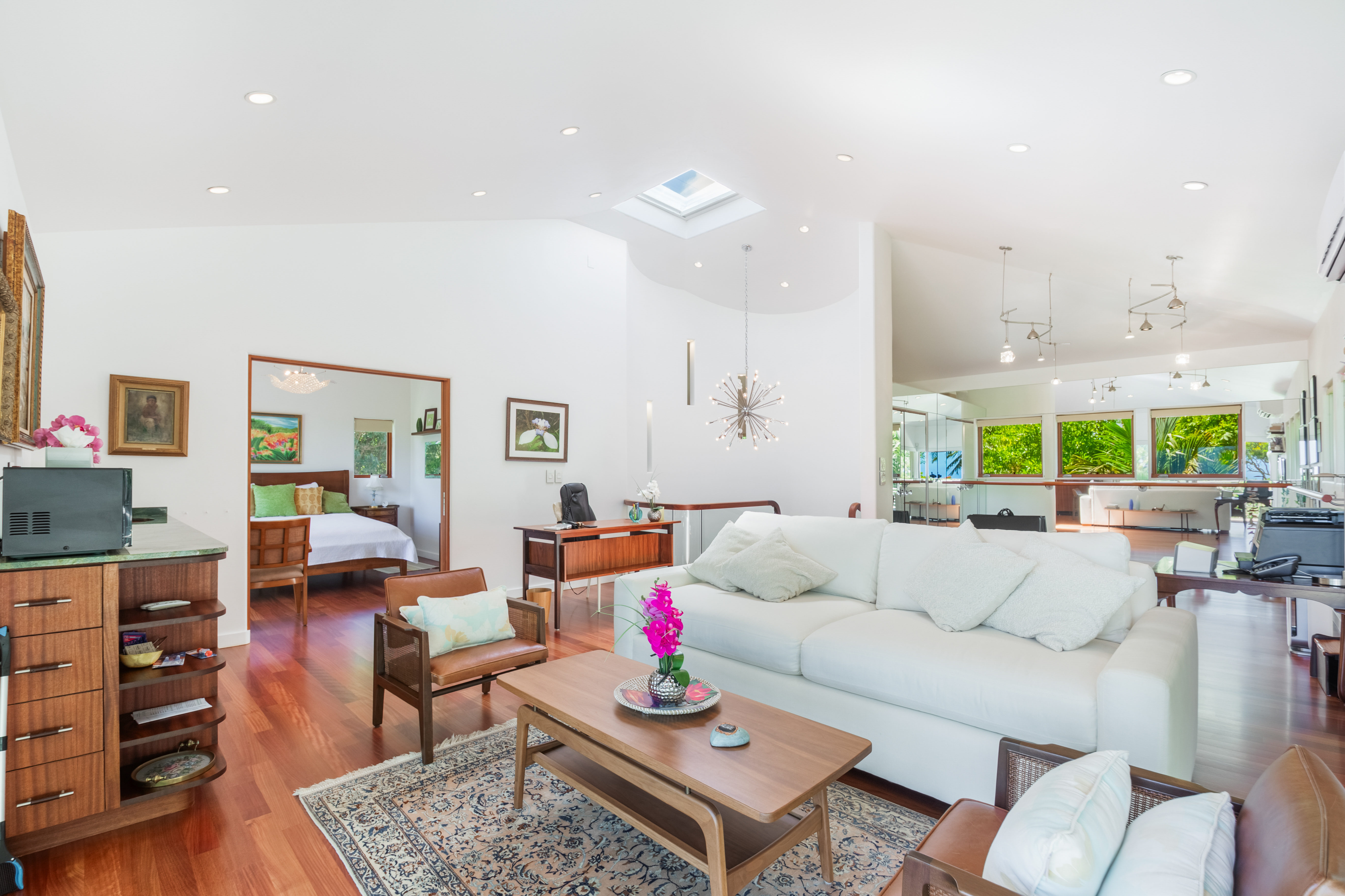 2874 A Kauapea Road Kilauea, HI 96754 - Photo 19 of 30 a living room with furniture and a large window