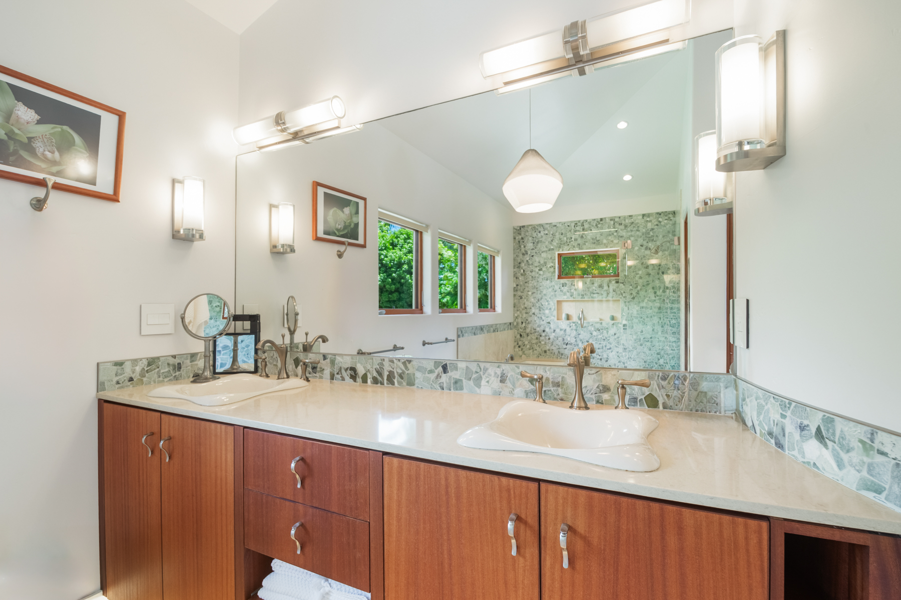 2874 A Kauapea Road Kilauea, HI 96754 - Photo 27 of 30 a bathroom with a sink double vanity and a mirror