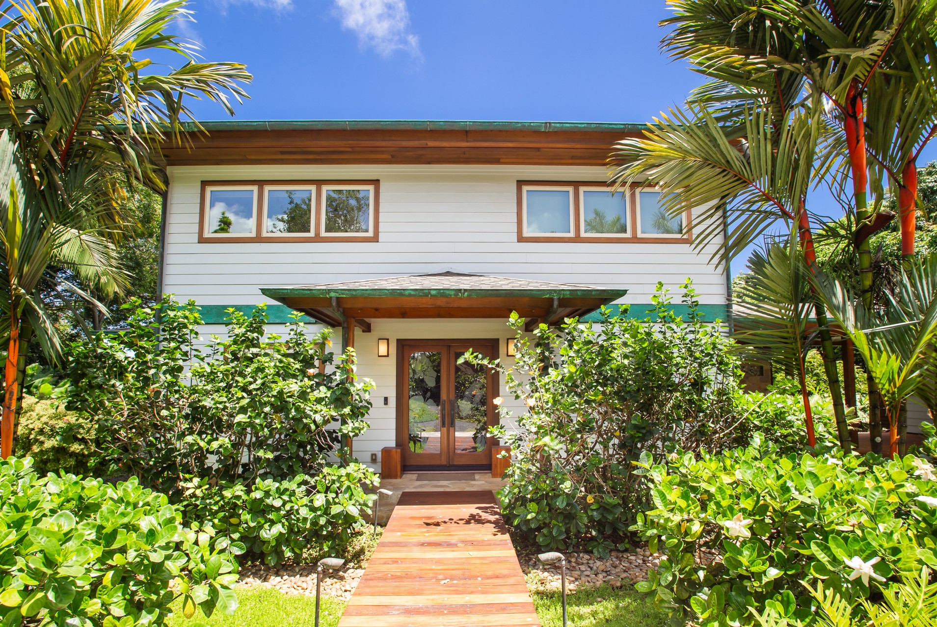 2874 A Kauapea Road Kilauea, HI 96754 - Photo 5 of 30 a front view of a house with a yard