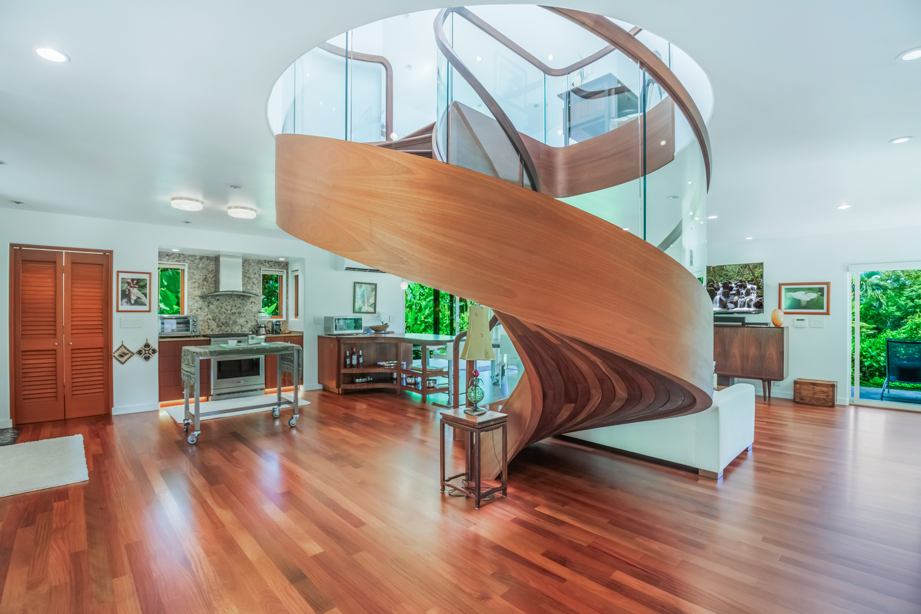 2874 A Kauapea Road Kilauea, HI 96754 - Photo 6 of 30 a view of a livingroom with furniture and hardwood floor