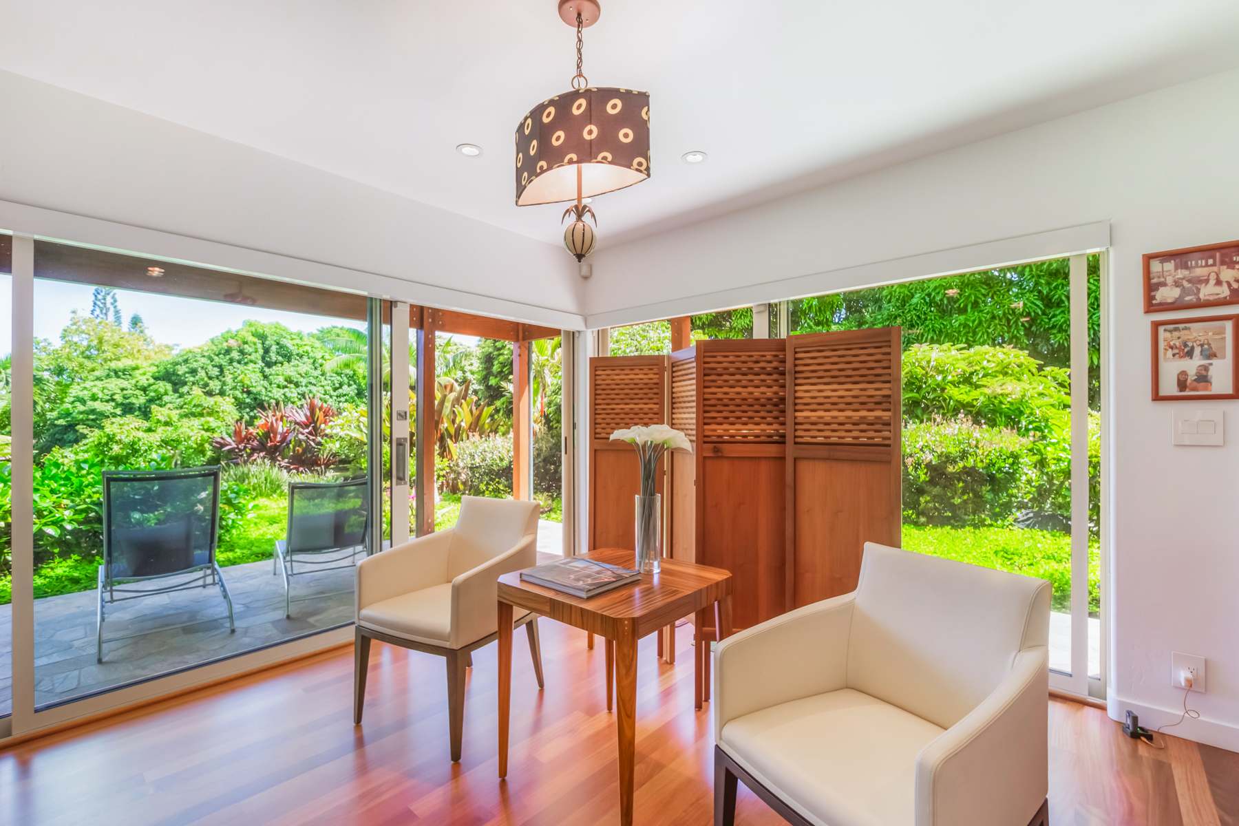 2874 A Kauapea Road Kilauea, HI 96754 - Photo 9 of 30 a view of a dining room with furniture window and wooden floor
