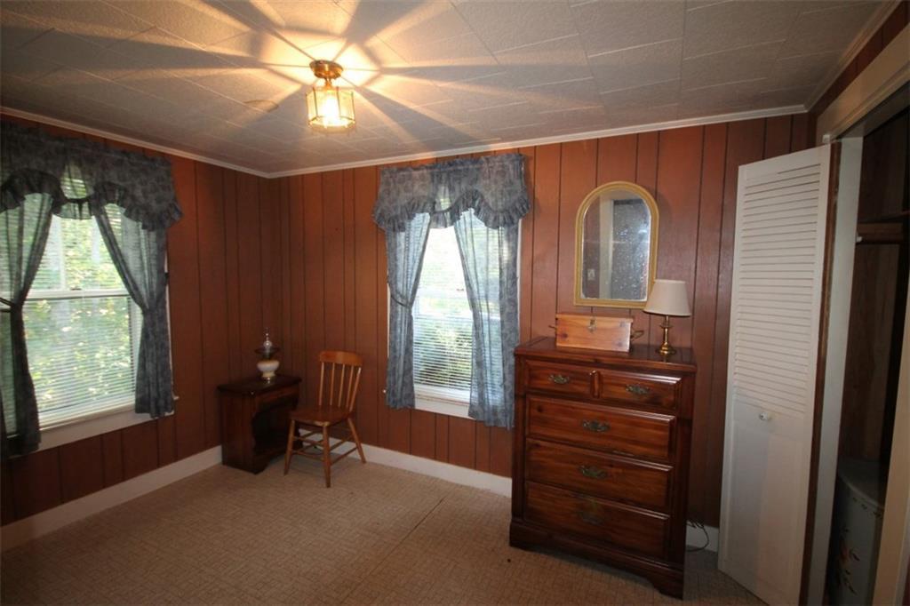 350 Ocean Point Road East Boothbay, ME 04544 - Photo 16 of 22 Bedroom with closet and linoleum...