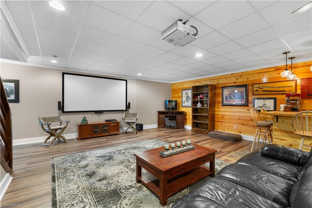 246 Bear Trail Lowgap, NC 27024 - Photo 23 of 50 Basement movie/living room with custom bar.