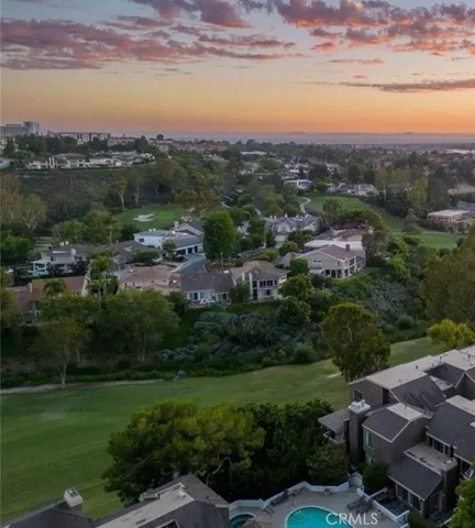 a view of a city with mountains in the background