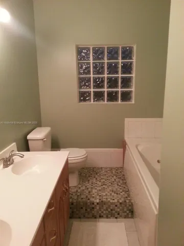 a bathroom with a sink and a bathtub