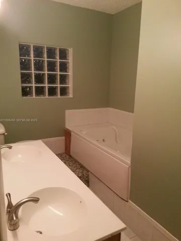 a bathroom with a tub