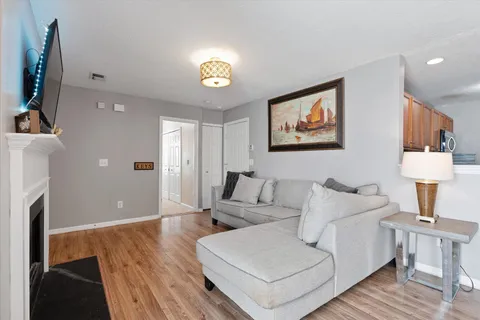 a spacious bedroom with a bed and a couch