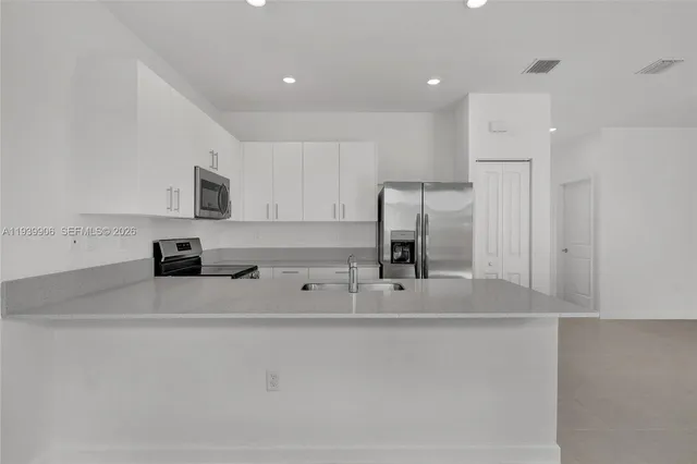 a view of a hallway with closet area