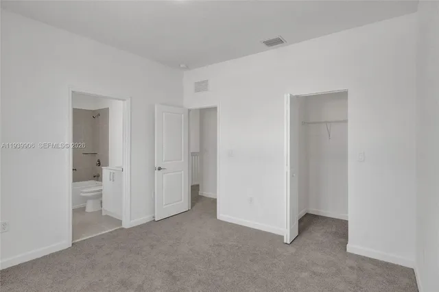 a view of hallway with stairs