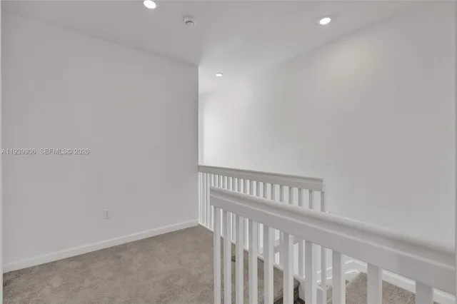 a bathroom with 2 sink and a mirror