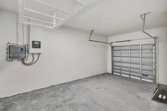 an empty room with entrance door