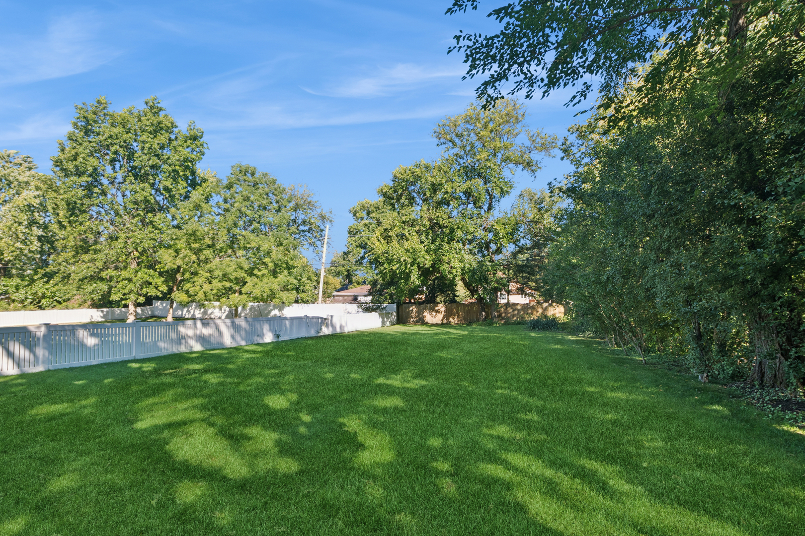 1850 Pine Road Homewood, IL 60430 - Photo 19 of 20 a view of a garden with a building in the background