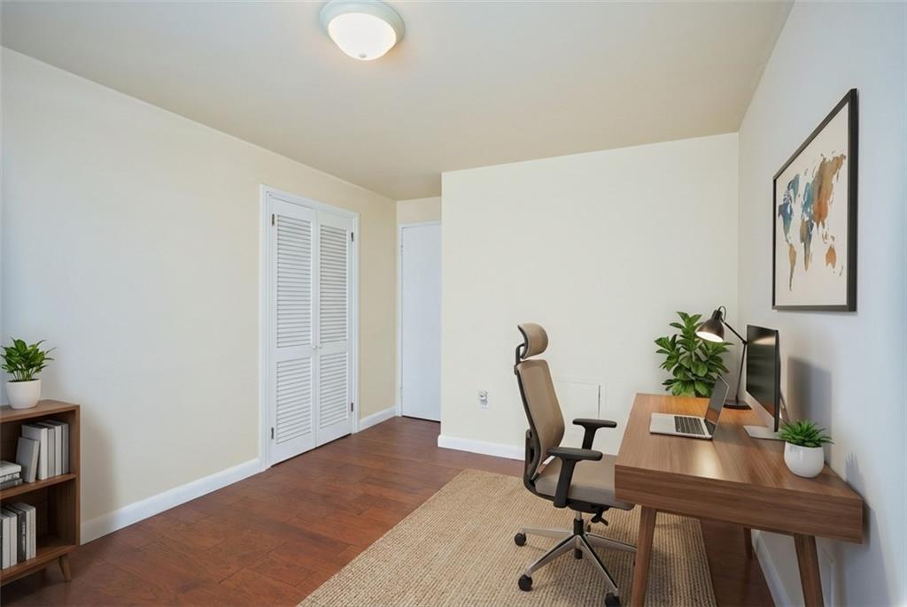 4625 Fifth Avenue, Unit 408 Pittsburgh, PA 15213 - Photo 20 of 34 a workspace with furniture and book shelf