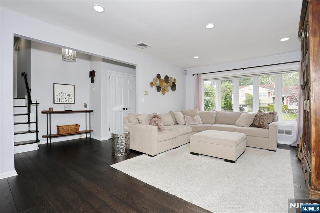 30 Brookfield Road Dumont, NJ 07628 - Photo 6 of 50 a living room with furniture and a large window