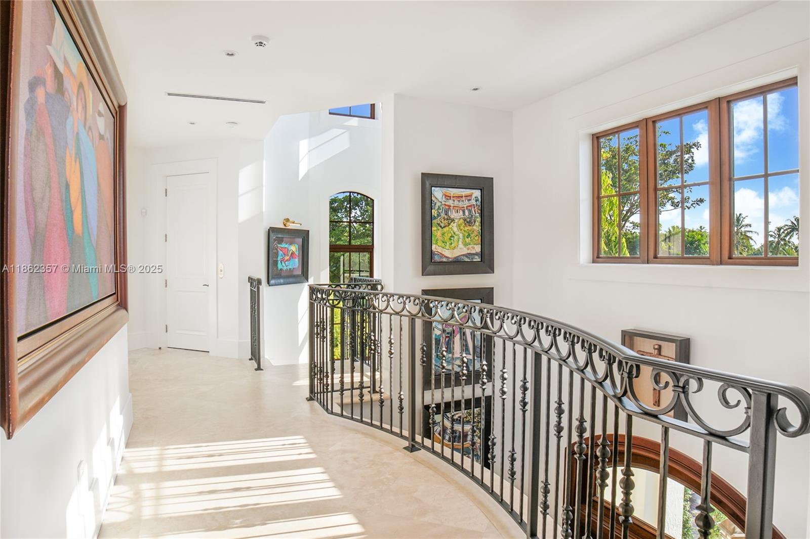365 Gulf Road Key Biscayne, FL 33149 - Photo 16 of 29 a view of a hallway with windows and stairs