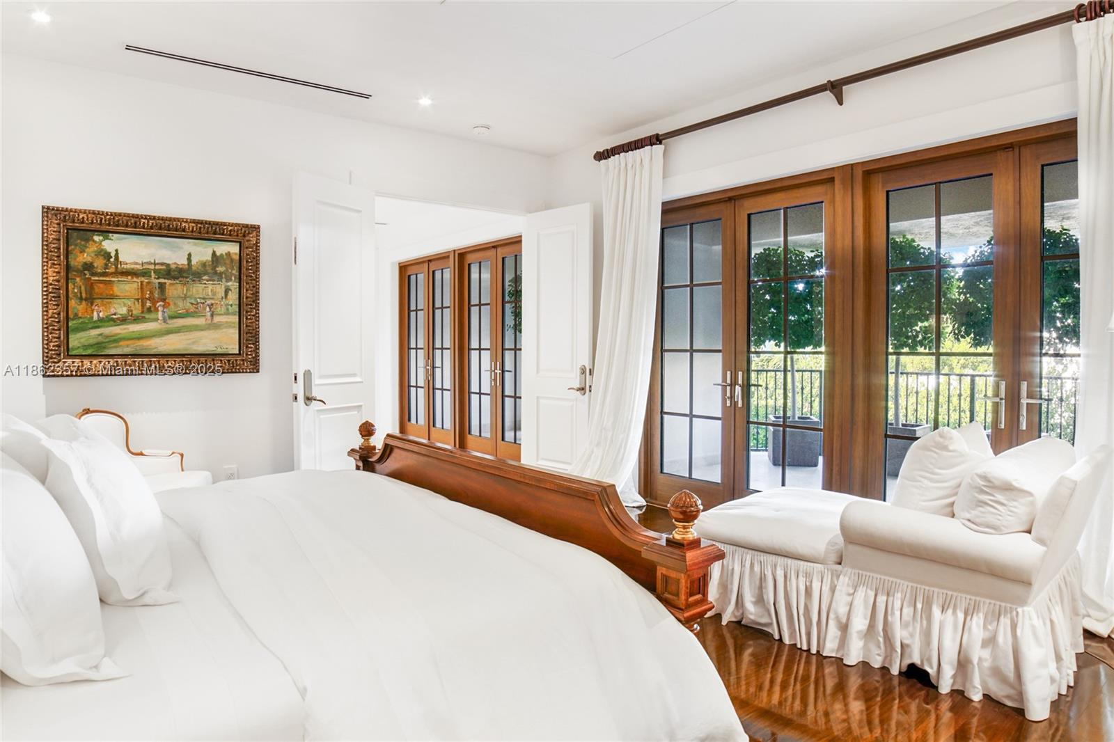 365 Gulf Road Key Biscayne, FL 33149 - Photo 23 of 29 a bedroom with bed and a large window